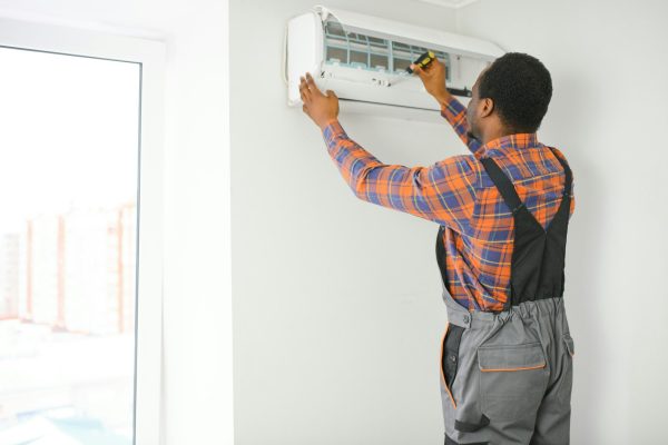 ac-electrician-technician-repairing-air-conditioner-appliance