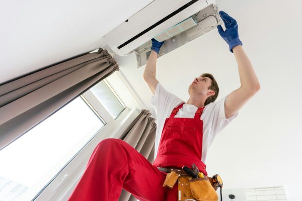 service-man-is-cleaning-repair-and-maintenance-of-air-conditioner